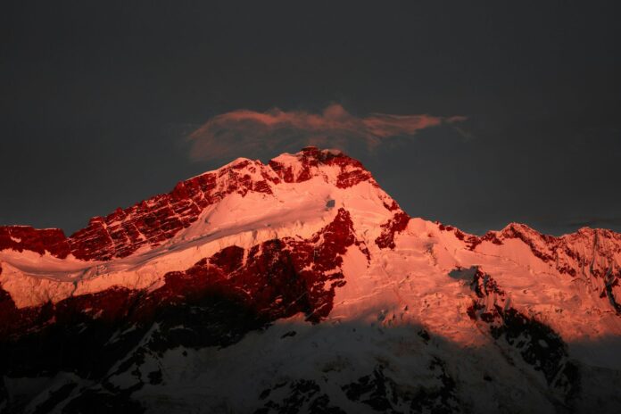 Red snow New Zealand Alps dust storms